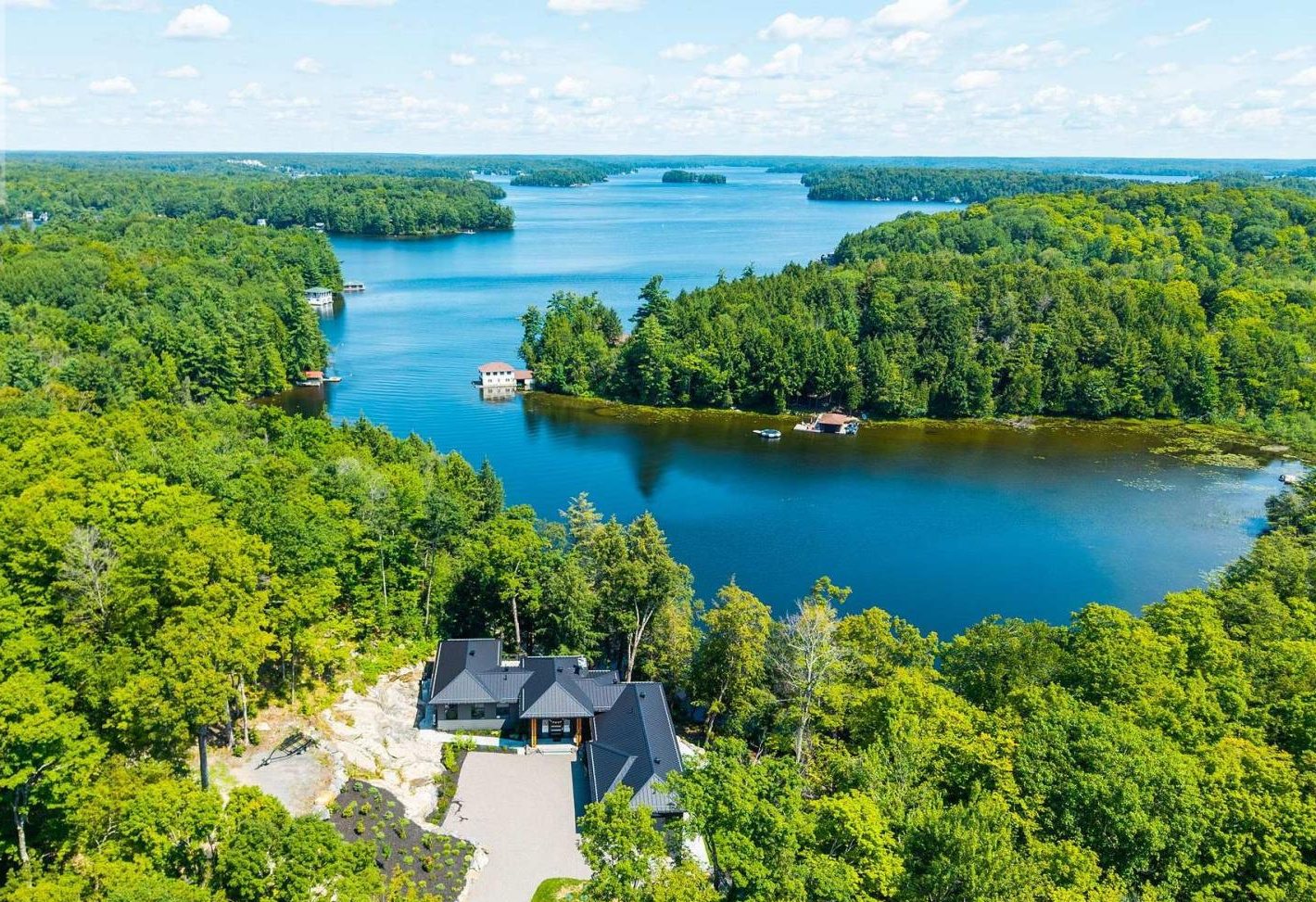 Muskoka lake house surrounded by forest
